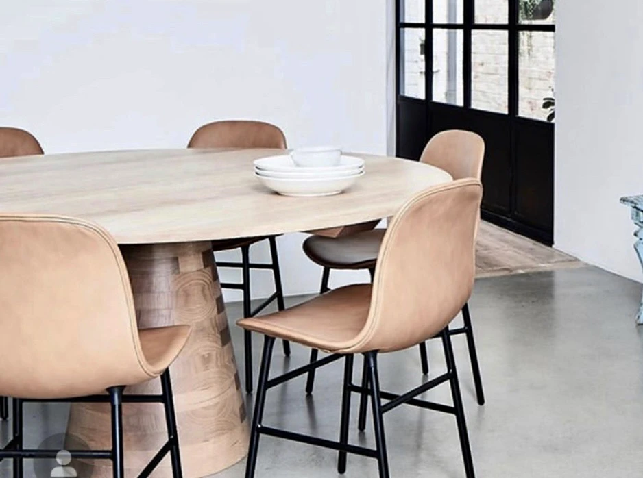 Level Design timber table in a styled interior